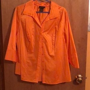 Orange woman’s button up shirt